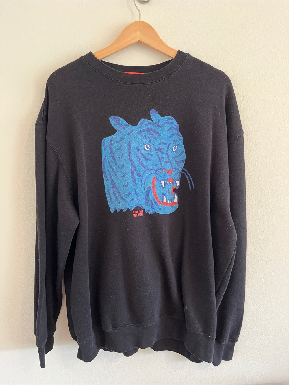 Black Women's Crewneck Sweatshirt with Blue Tiger Graphic